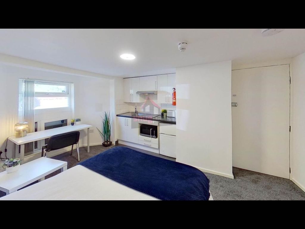 Property photo 3 of 8 Bright And Inviting Living Room With Modern Furnis...