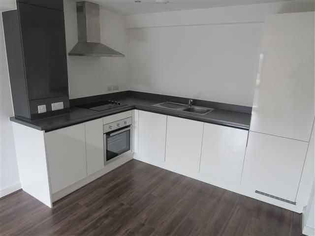 Property photo 3 of 8 Kitchen
