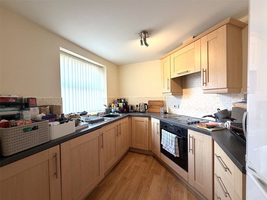 Property photo 3 of 12 Kitchen