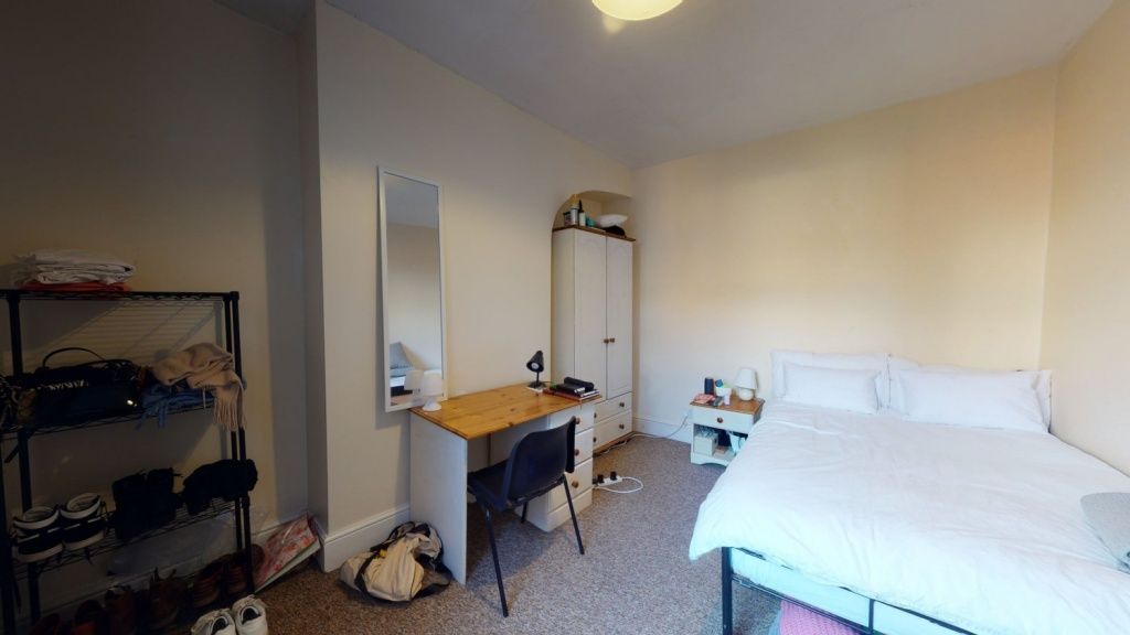 Property photo 2 of 8 Bright And Cozy Master Bedroom Featuring A Double ...