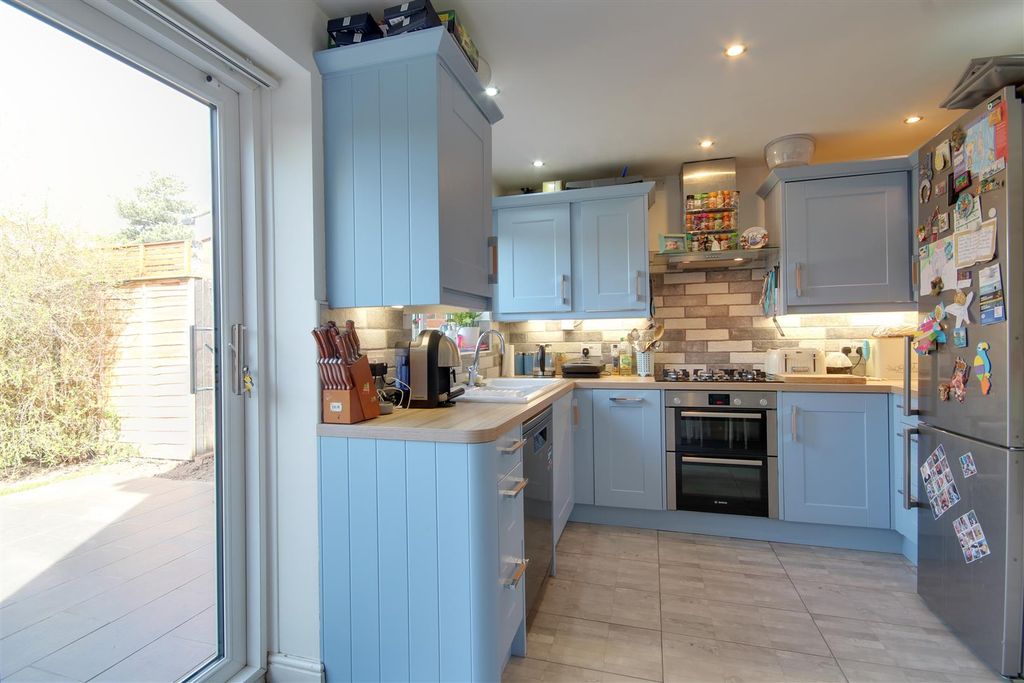 Property photo 3 of 12 Dining Kitchen