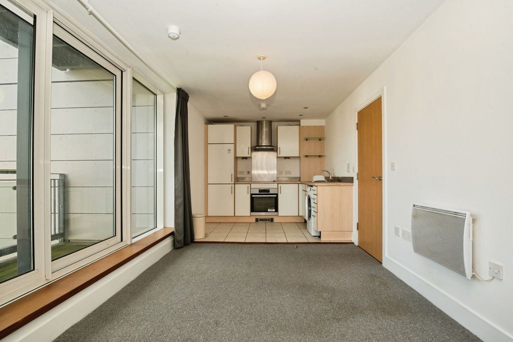 Property photo 3 of 16 Living/Dining Area