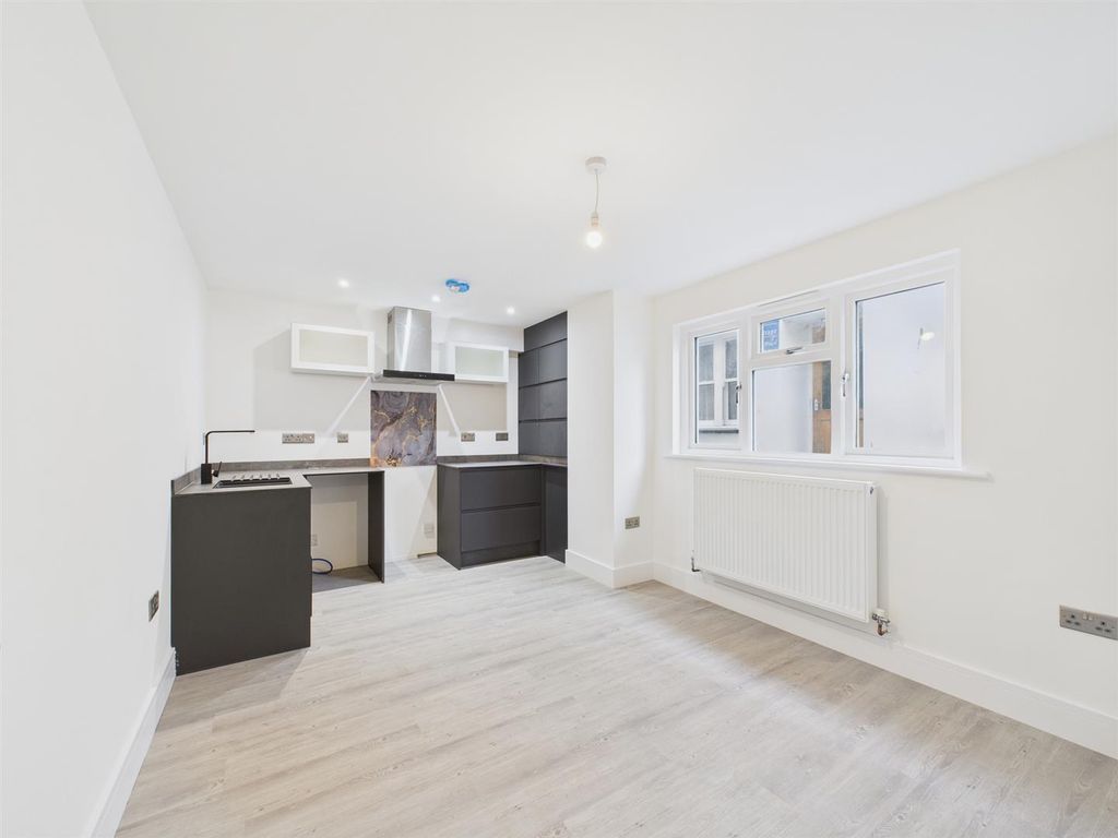 Property photo 3 of 8 Kitchen / Living Area