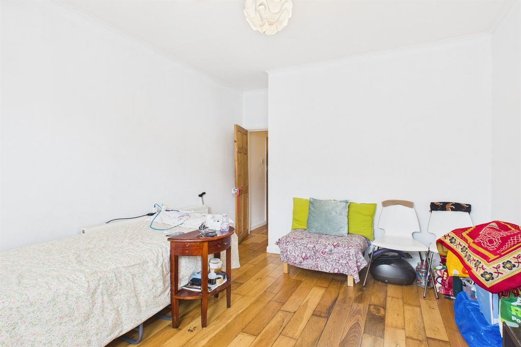 Property photo 3 of 12 Living Area