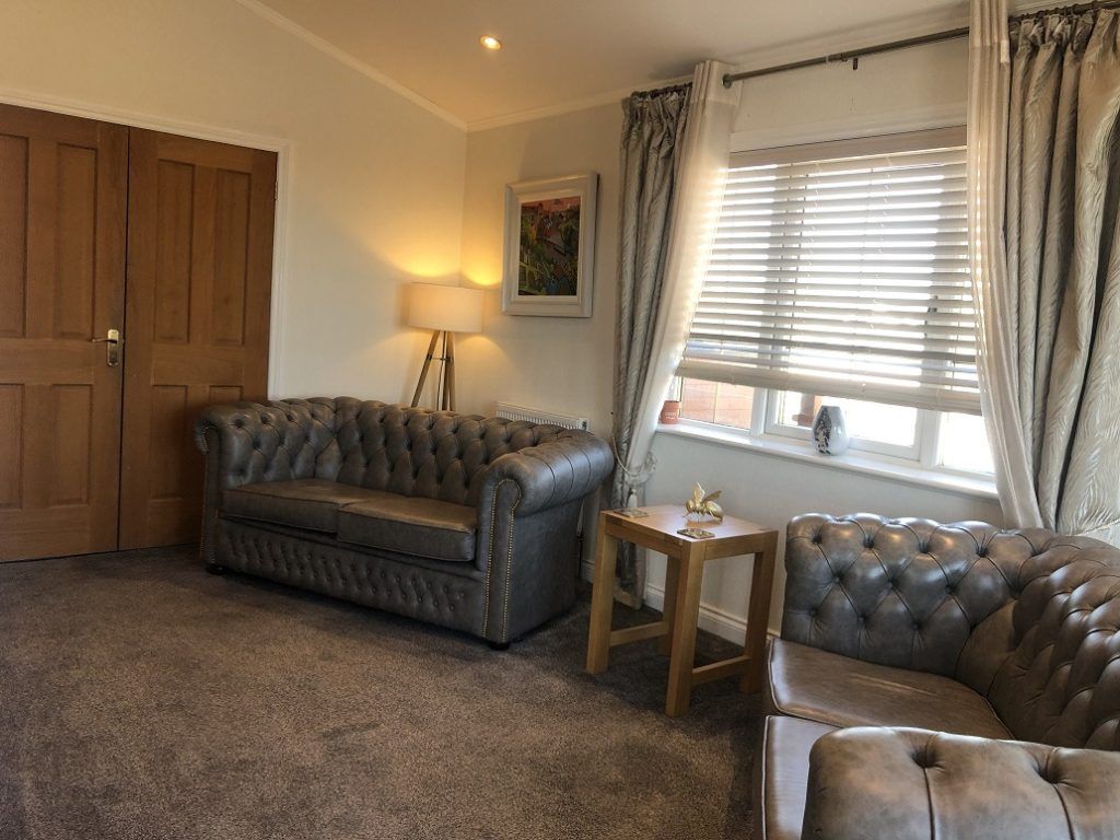 Property photo 3 of 18 Comfortable Lounge With Leather Seating And Large Window