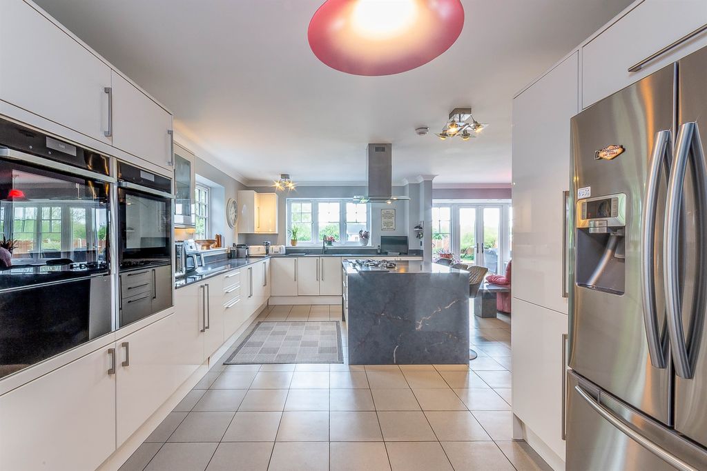 Property photo 2 of 21 Kitchen/Dining/Family Room