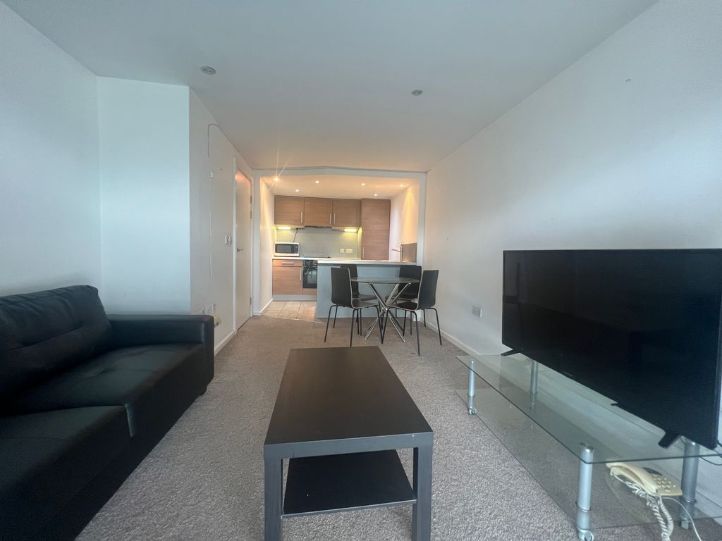 Property photo 1 of 7 Living Area