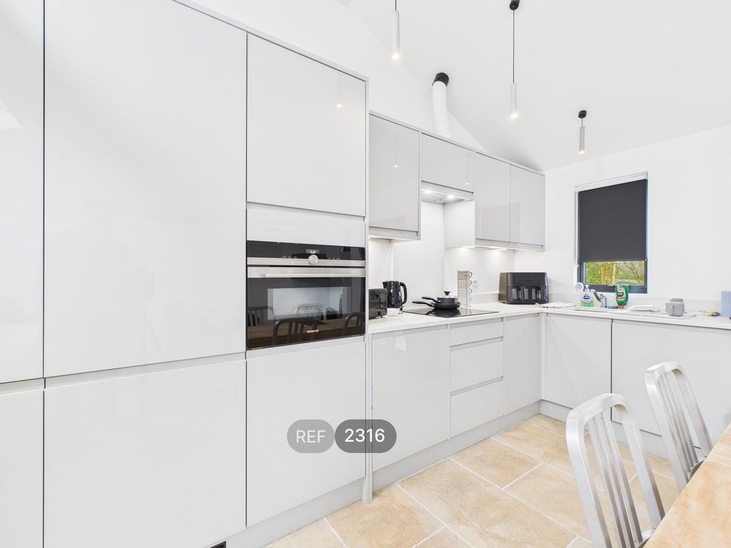 Property photo 2 of 16 Kitchen/Living Area