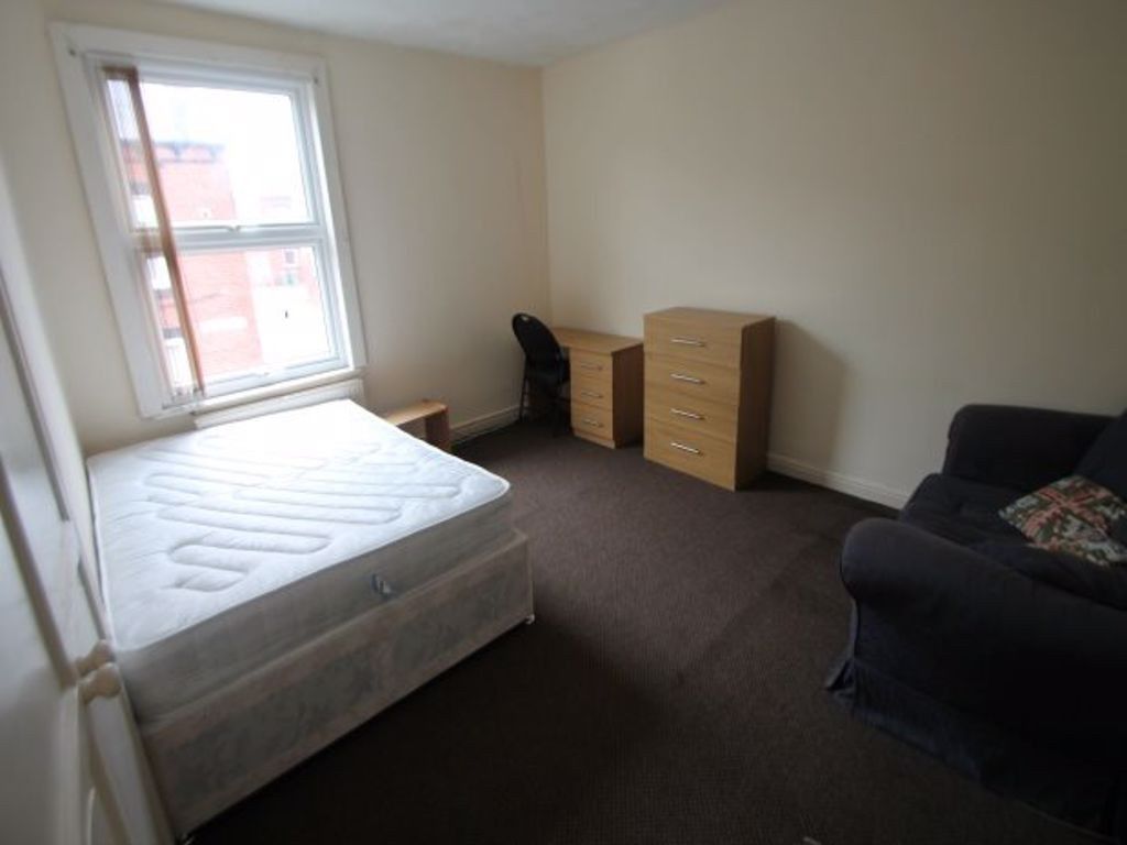 Property photo 2 of 12 Bright Master Bedroom Featuring A Large Window Tha...