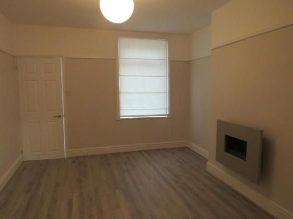 Property photo 2 of 8 Living Room