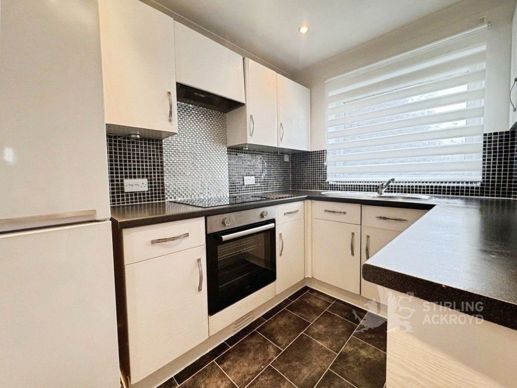 Property photo 3 of 8 Kitchen
