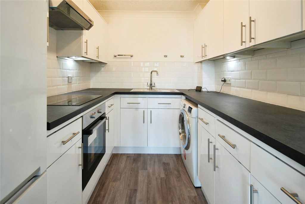 Property photo 3 of 12 Kitchen