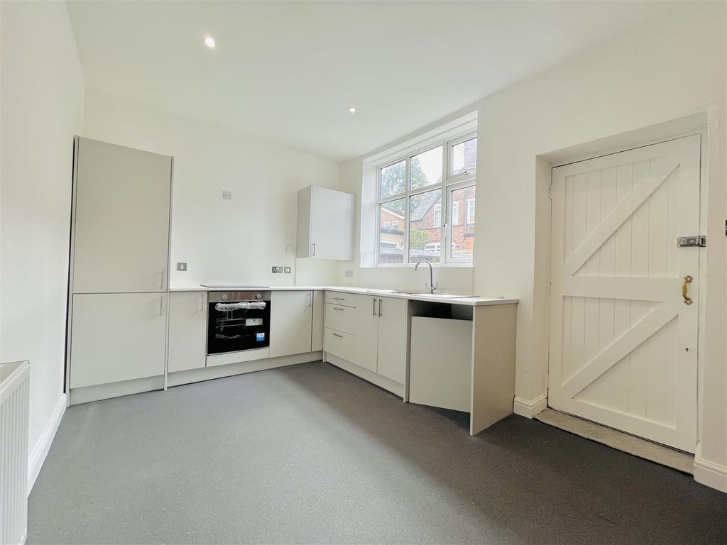 Property photo 3 of 19 Dining Kitchen