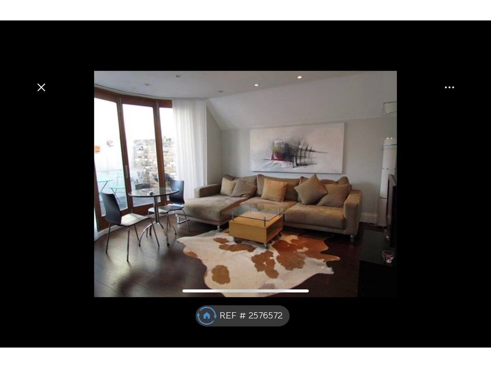 Property photo 1 of 9 Living Area
