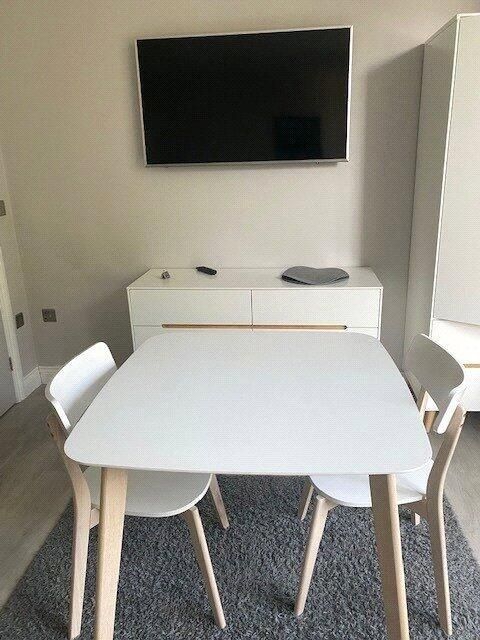 Property photo 3 of 5 Bright Communal Lounge Featuring A Modern White di...