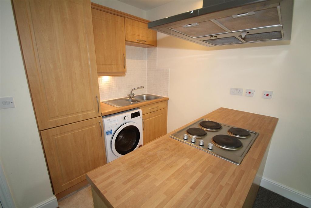 Property photo 2 of 8 Kitchen Area