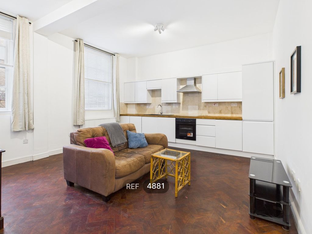 Property photo 1 of 11 Kitchen/Living Area