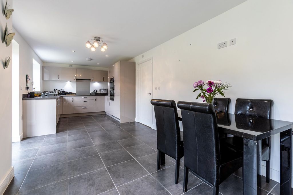 Property photo 3 of 14 Dining Kitchen