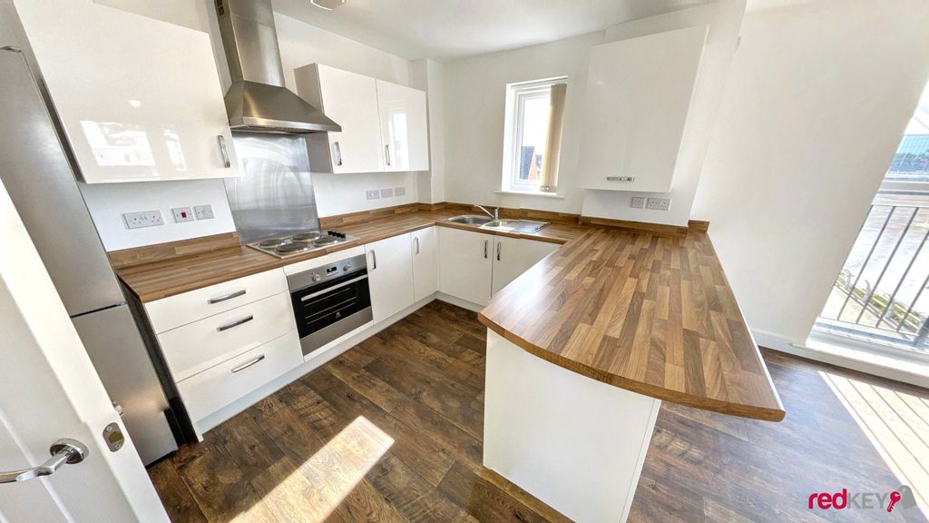 Property photo 3 of 8 Kitchen