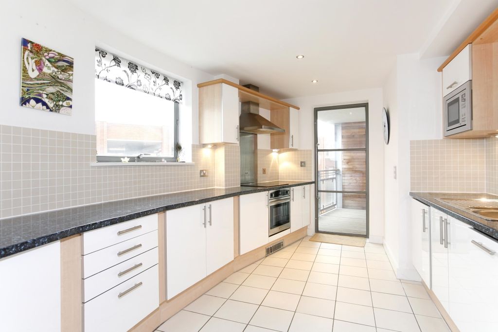 Property photo 2 of 8 Kitchen