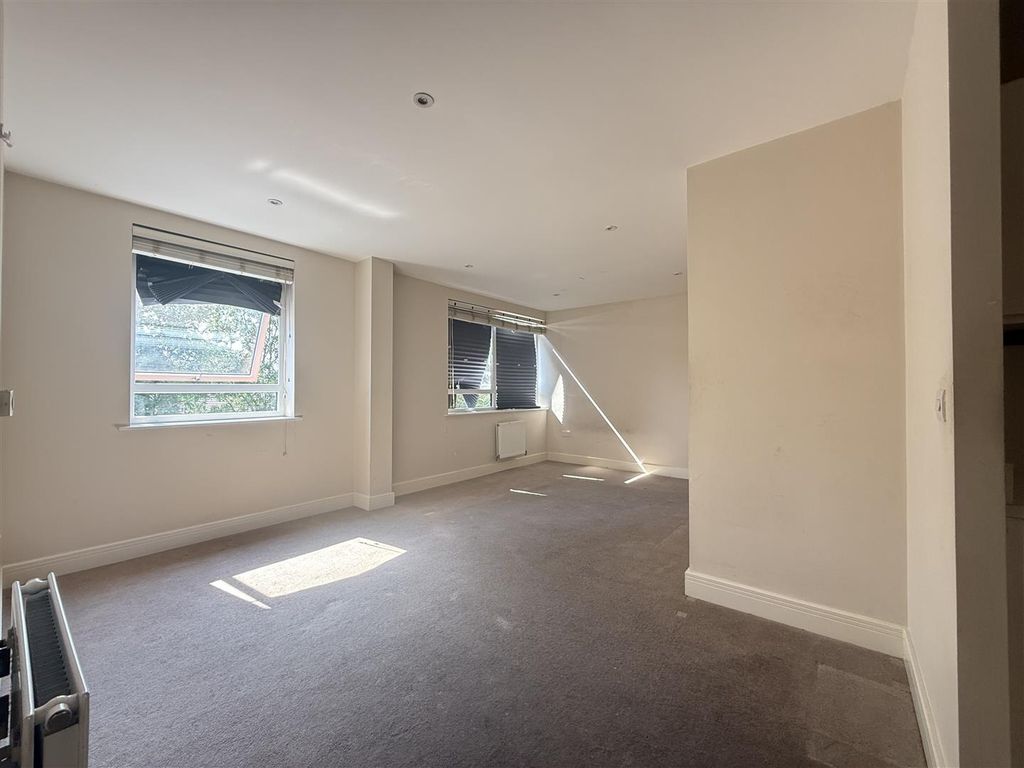 Property photo 2 of 10 Living Area