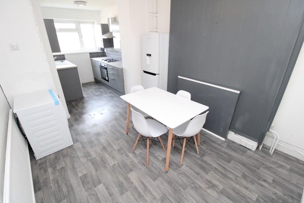 Property photo 3 of 7 Modern Open Kitchen With Stylish Dining Area...