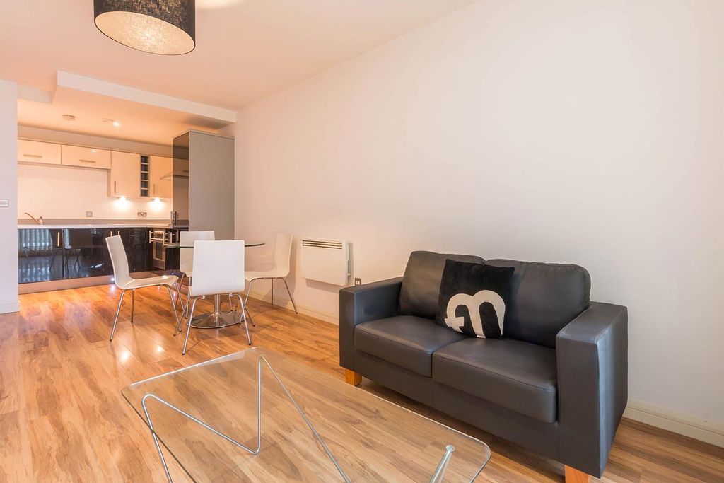 Property photo 1 of 9 Living Area