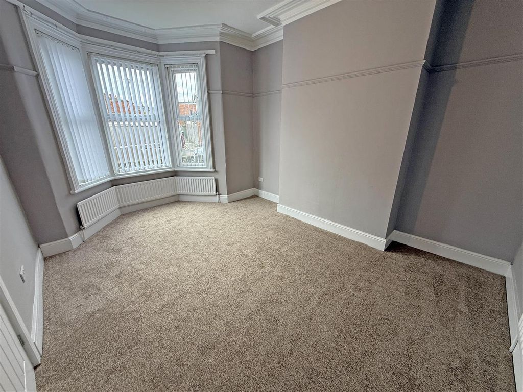 Property photo 2 of 11 Living Room.Jpg