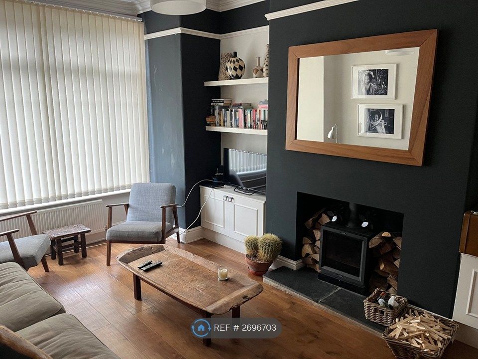 Property photo 1 of 19 Living Room. Triple Glazing. Wood Burner