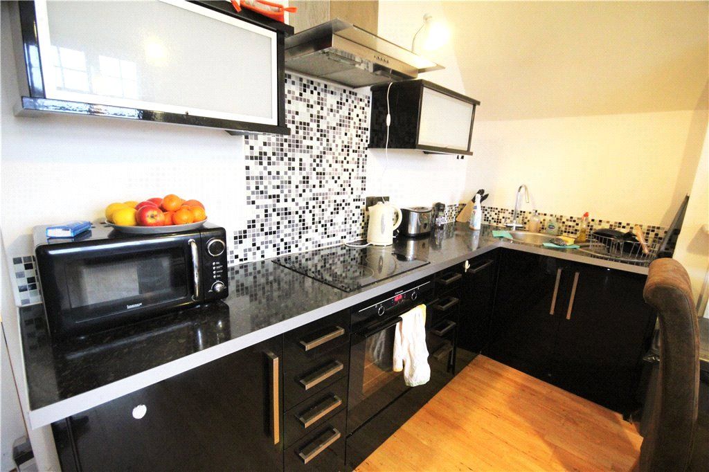 Property photo 3 of 7 Kitchen