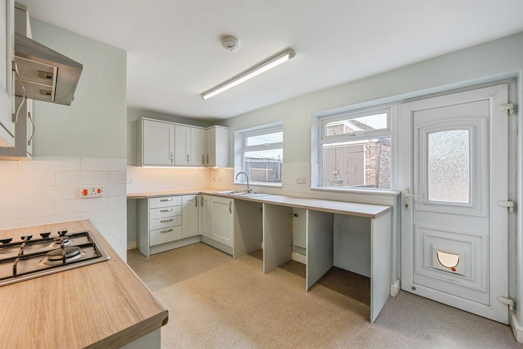 Property photo 3 of 14 Breakfast Kitchen: