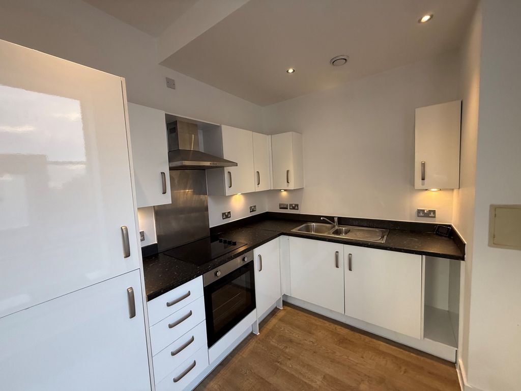 Property photo 3 of 12 Kitchen
