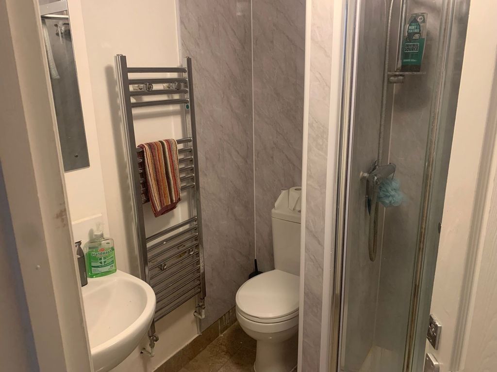 Property photo 2 of 11 Modern Bathroom With Sleek Heated Towel Rail....