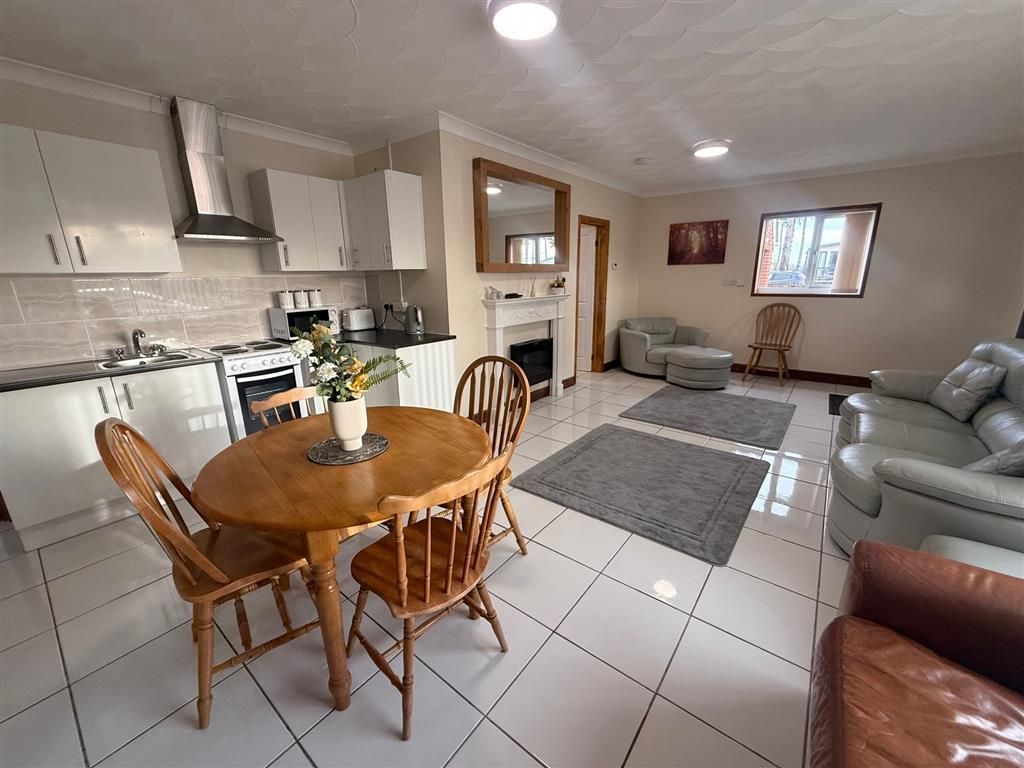 Property photo 2 of 8 Living Room