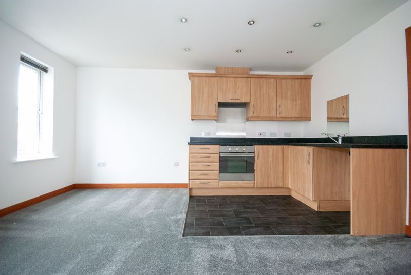 Property photo 3 of 8 Kitchen And Dining Areas