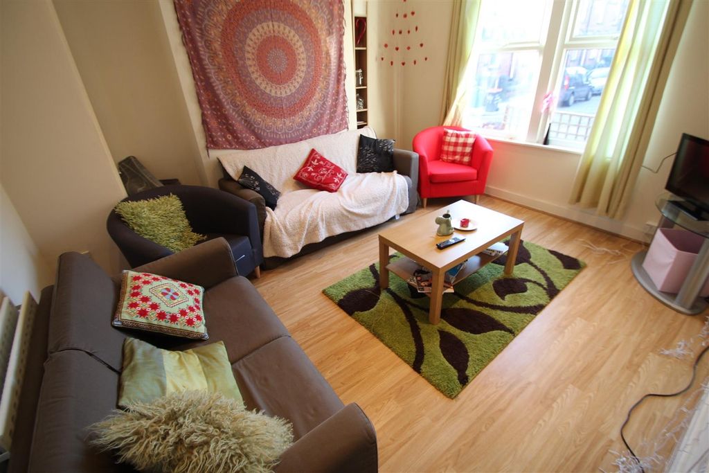 Property photo 1 of 8 Bright And Welcoming Living Room With Large Window...