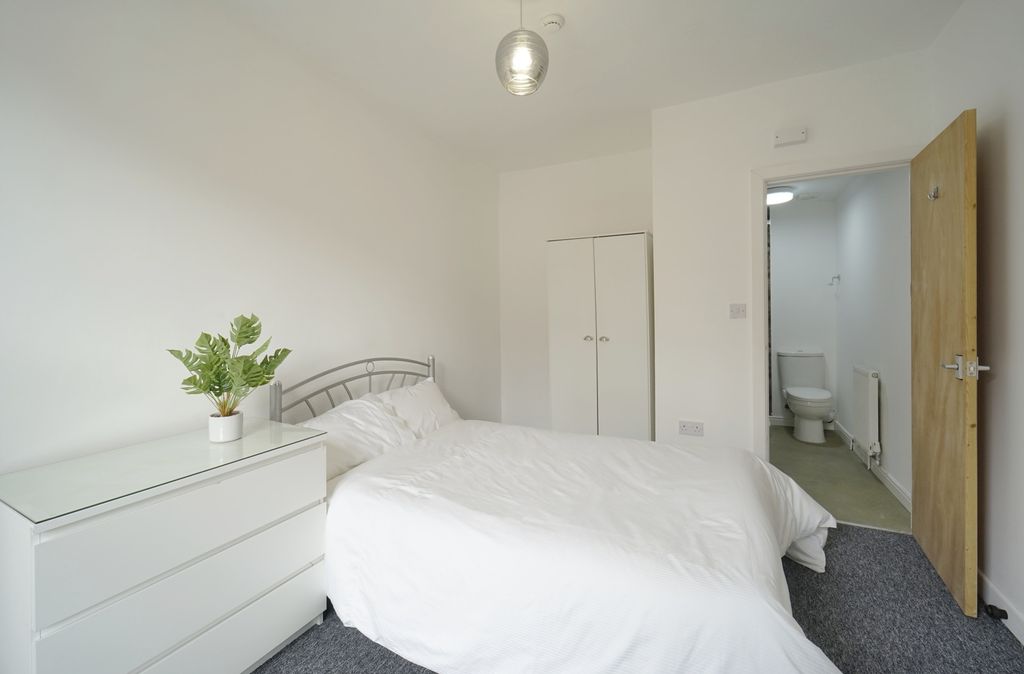 Property photo 1 of 28 A Bright And Inviting Master Bedroom Featuring A N...