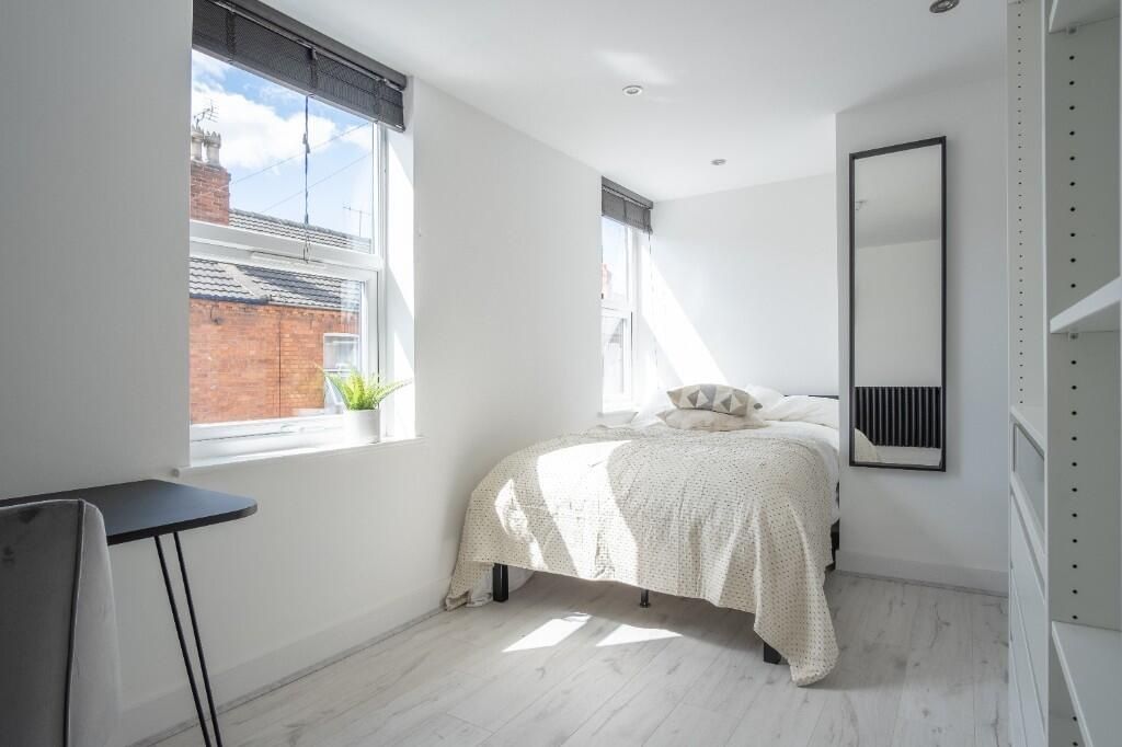 Property photo 1 of 12 Bright And Airy Master Bedroom Featuring A Comfort...