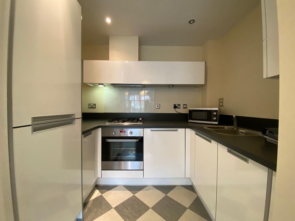 Property photo 3 of 8 Kitchen