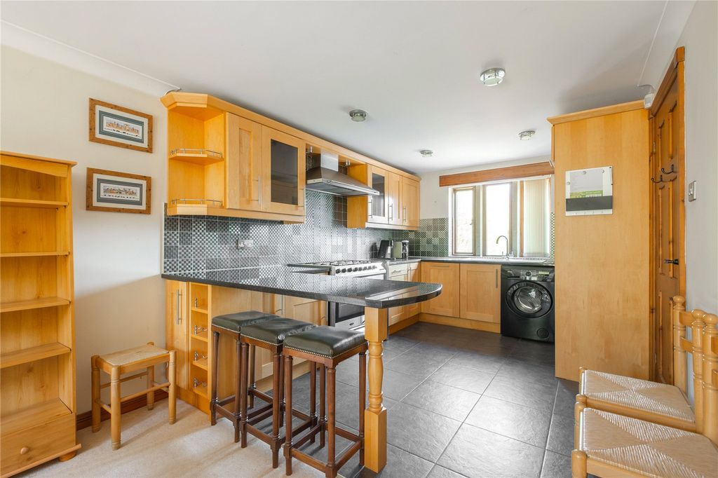 Property photo 3 of 21 Dining Kitchen