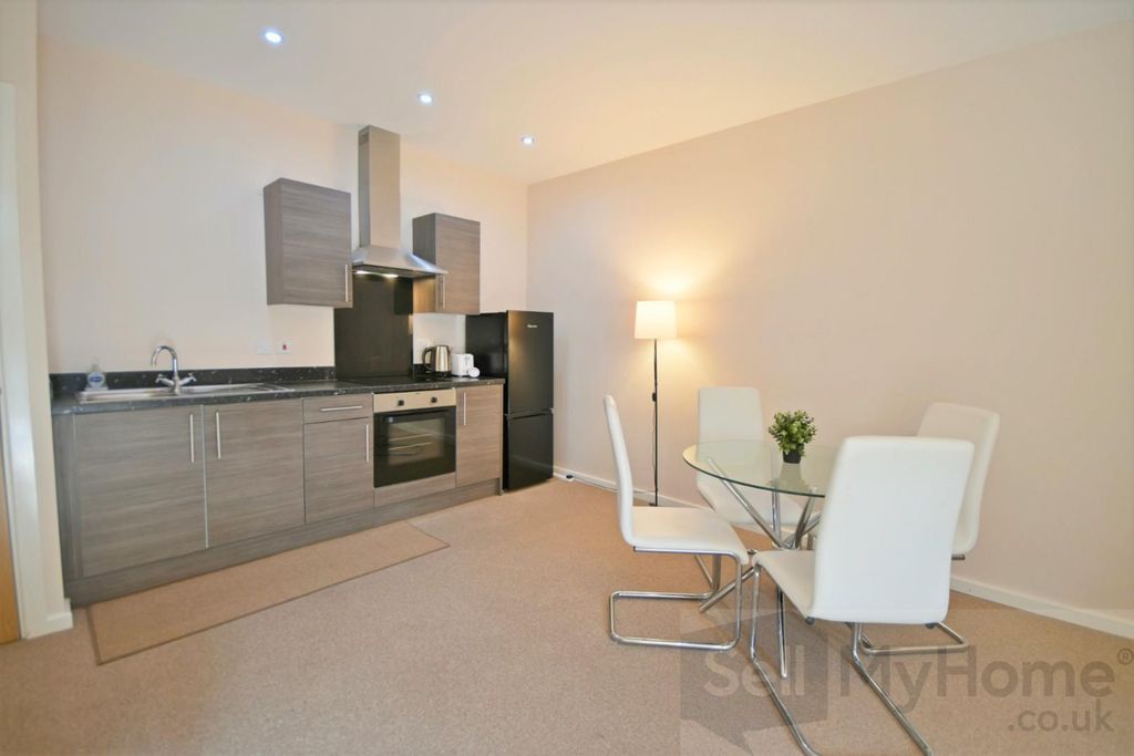 Property photo 2 of 10 Kitchen Area