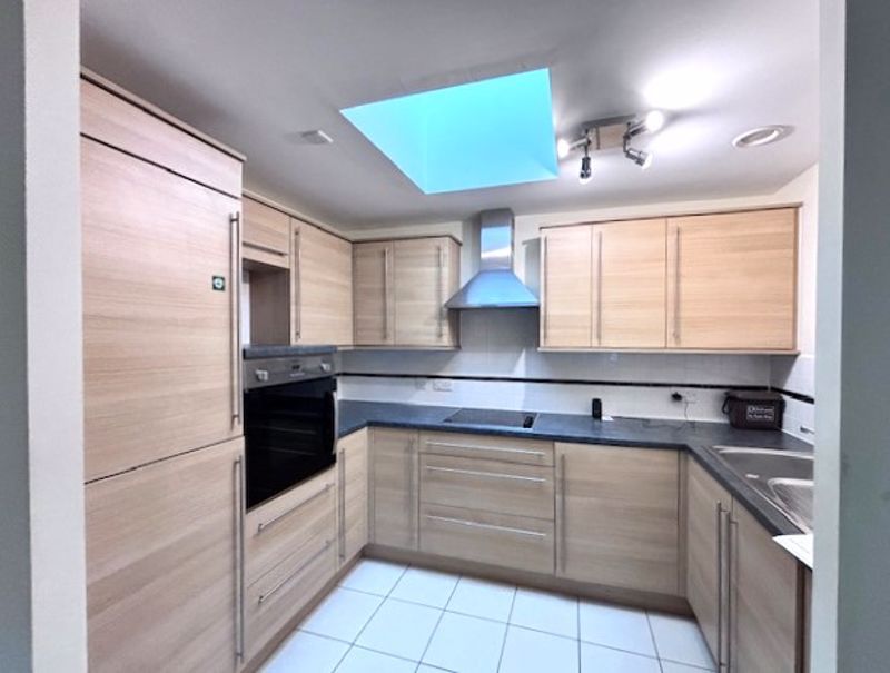 Property photo 3 of 7 Kitchen