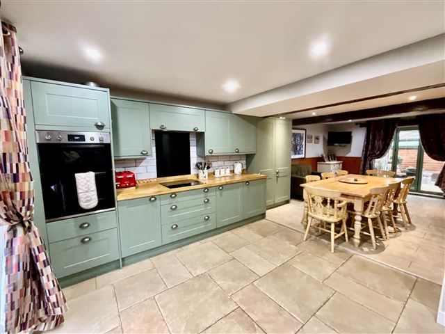 Property photo 3 of 21 Dining Kitchen