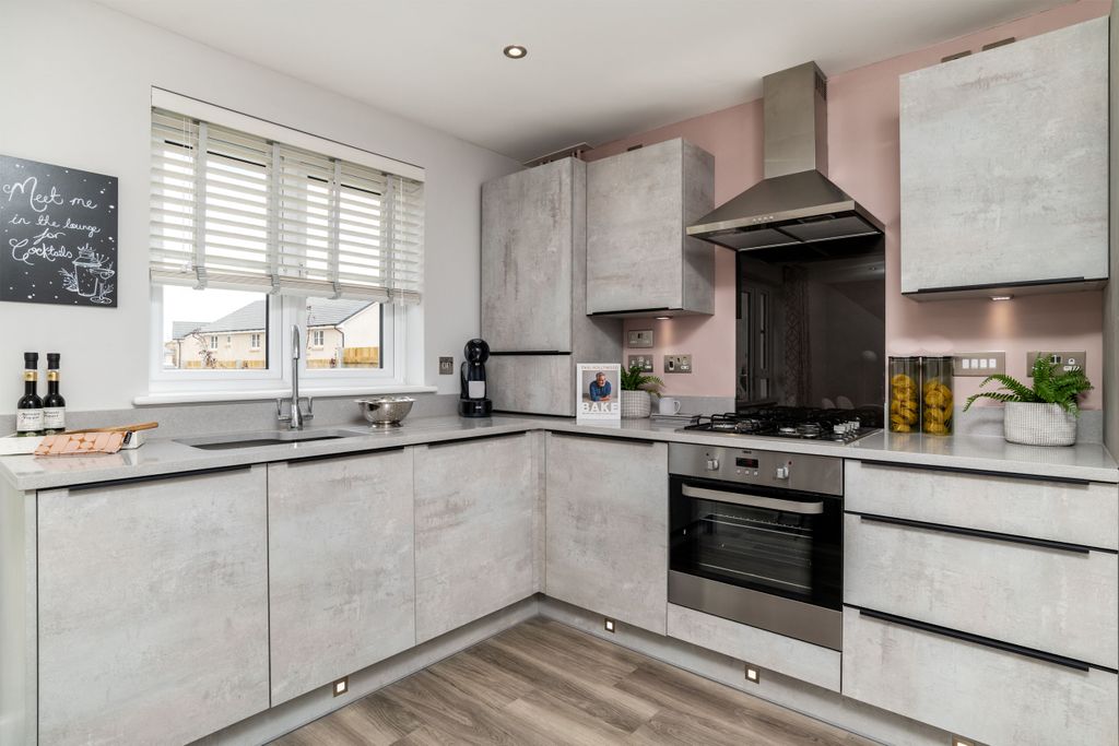 Property photo 3 of 10 Kitchen In Three Bedroom Home