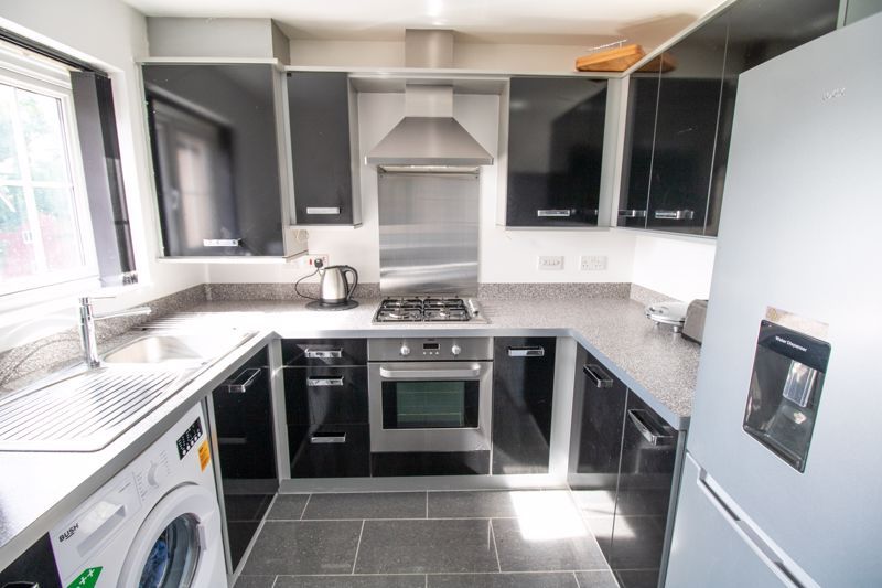 Property photo 3 of 8 Kitchen