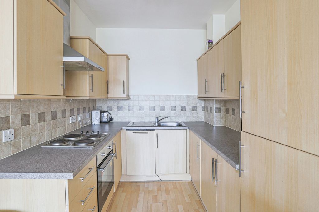 Property photo 3 of 8 Kitchen