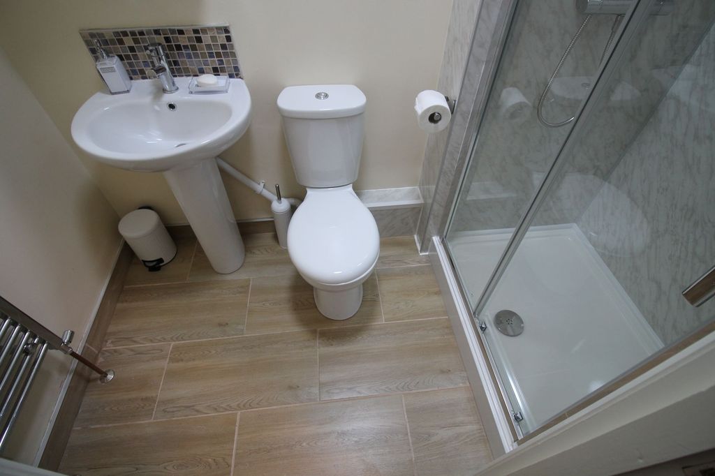 Property photo 3 of 6 Bright, Modern Bathroom With A Walk-In Shower, Ped...