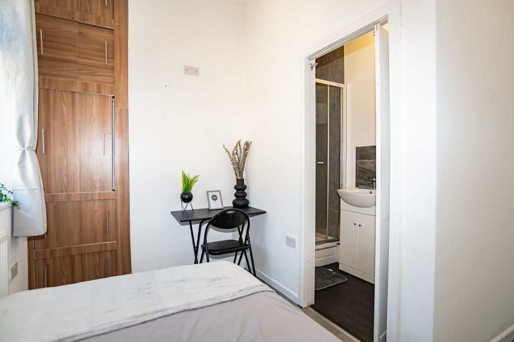 Property photo 2 of 10 A Clean And Modern Bathroom With A Shower, Small S...