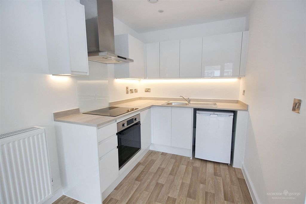 Property photo 2 of 14 Kitchen Area