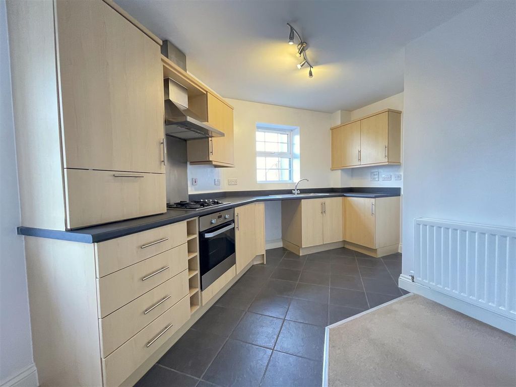 Property photo 2 of 15 Kitchen Area